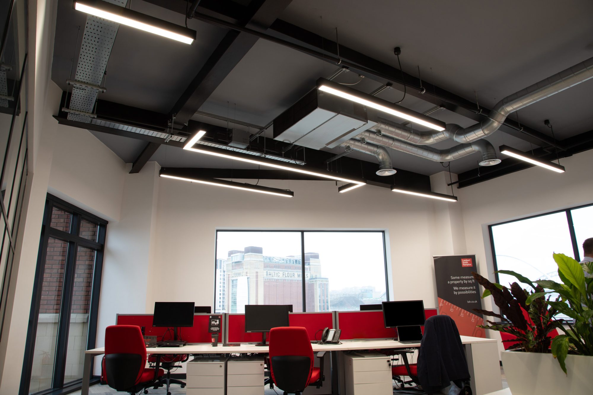 Lambert Smith Hampton offices with Infinitas Micro Direct and Infinitas Micro Corner Direct Luminaires.