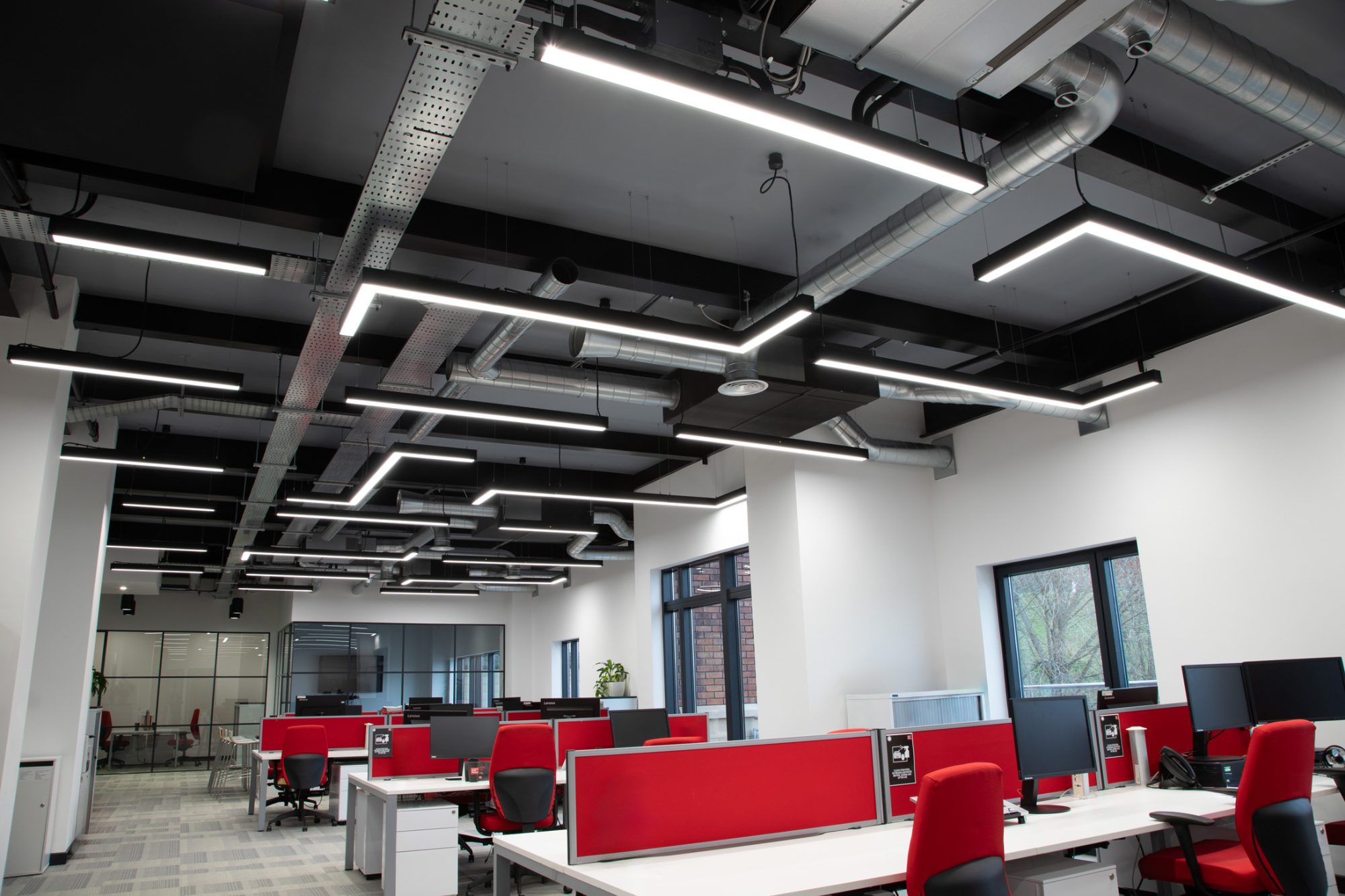 Lambert Smith Hampton offices with Infinitas Micro Direct, Infinitas Micro Corner Direct and Soledo Pendant Luminaires.